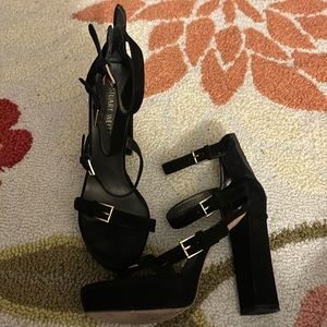 Black strappy Stuart Weitzman heels